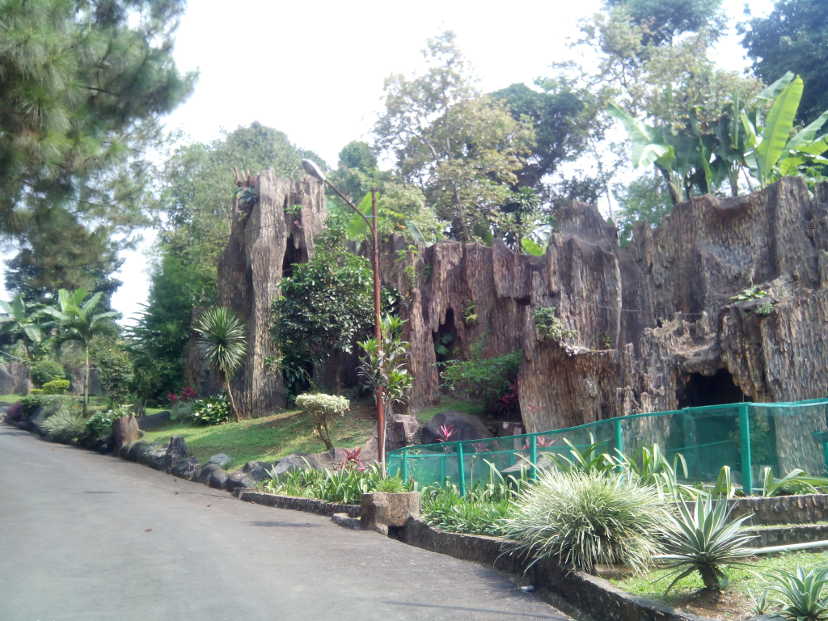 Artistic rock decoration on the road side of resort entrance